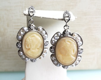 Cameo earrings in worked white coral paste. Vintage earrings. Antique earrings.