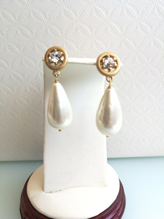 White pearl earrings. Vintage antique earrings. An