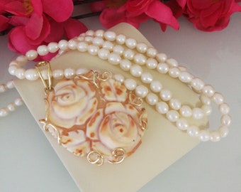 Original shell cameo necklace from Torre del Greco Italia with natural white pearls. Sardonic cameo.