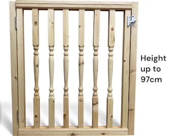 May include: A light-coloured wooden gate with vertical spindles and a rectangular frame. The gate has a metal hinge and latch. The text on the image reads "Height up to 97cm" and "Full width up to 92cm".