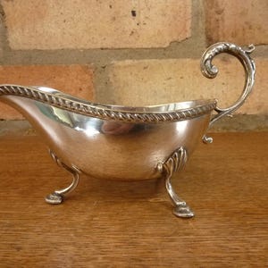a nice Small vintage  Sheffield silver plated Sauce boat jug