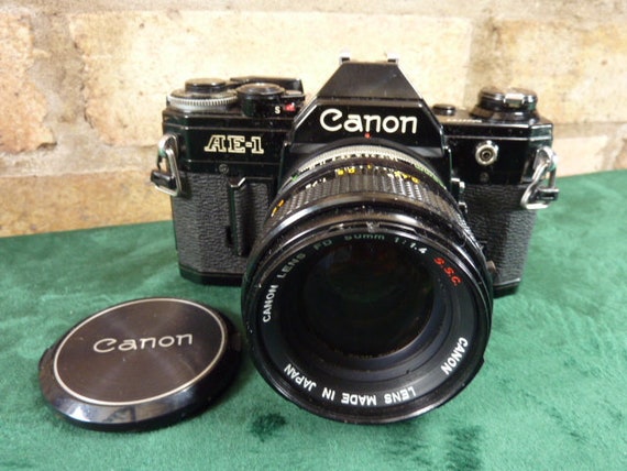 Appareil Photo Canon AE-1 Program - 35mm - Objectif FD 50mm F/1.4 SSC - Noir - Japon