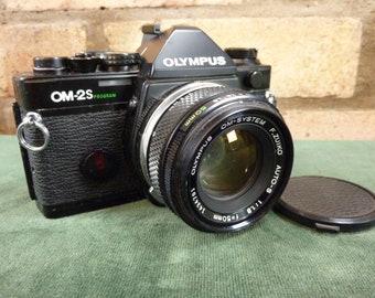 A Nice Vintage Olympus OM2s program 35MM SLR camera Zuiko 1:1.8 50mm lens