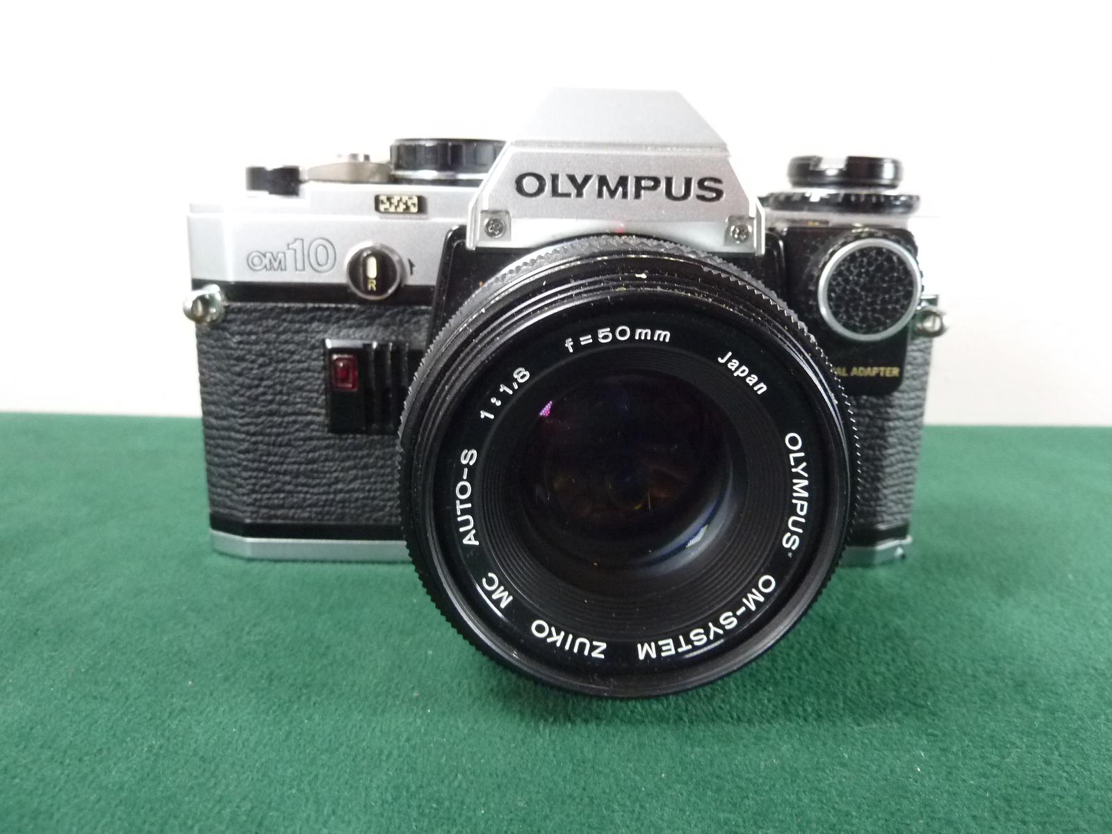 Appareil Photo Olympus OM-10 + Zuiko 50mm f/1.8 et flash et
