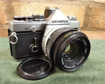 A Nice Vintage Olympus OM2 35MM SLR camera Zuiko 1:1.8 50mm lens