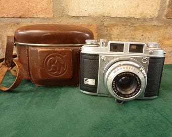 Bonita cámara vintage Balda Super Baldina de 35 mm, lente de 50 mm y 1:2.8.