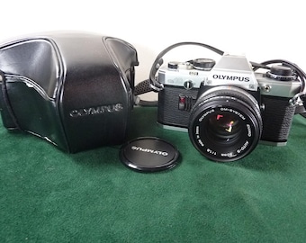 Black Olympus OM-10 35mm SLR Film Camera With Data Back + F Zuiko