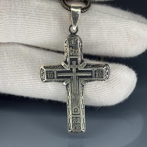 Unique Byzantine Orthodox Cross Necklace in solid 925 sterling silver, decorated with engraved Eastern Christian symbols. This artisan handmade pendant is a spiritual keepsake, perfect as a men’s religious necklace, faith jewelry, or gift for those who appreciate Orthodox heritage and Christian devotion.