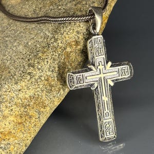 Byzantine Engraved Orthodox Cross Necklace made from 925 sterling silver with artisan craftsmanship. Featuring detailed Eastern Christian inscriptions, this spiritual pendant represents faith and devotion, offering a meaningful religious necklace for men, a handmade Christian jewelry piece, and a special baptism or Easter gift.