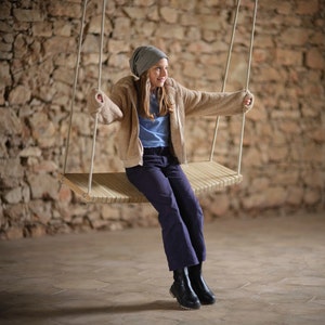 Flexible oakwood-felt indoor swing for adult and kids