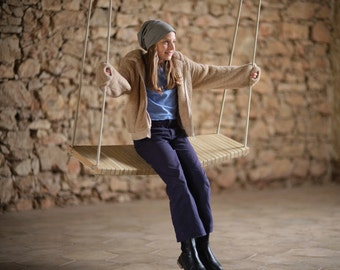 Flexible oakwood-felt indoor swing for adult and kids