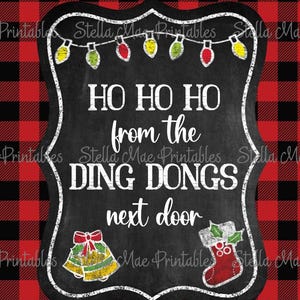 May include: A black chalkboard sign with a red and black buffalo plaid background. The sign says "HO HO HO from the DING DONGS next door" with a string of Christmas lights, a bell, and a stocking.