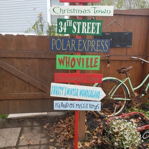 Christmas Directional Sign Porch Sign Distressed Wood Lawn Ornament Christmas Destination Yard Sign Christmas Movie Decor North Pole
