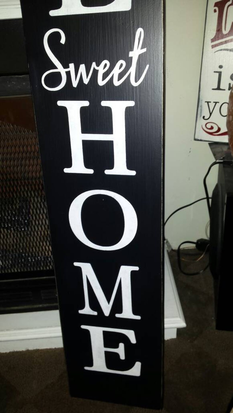 vertical wooden porch signs