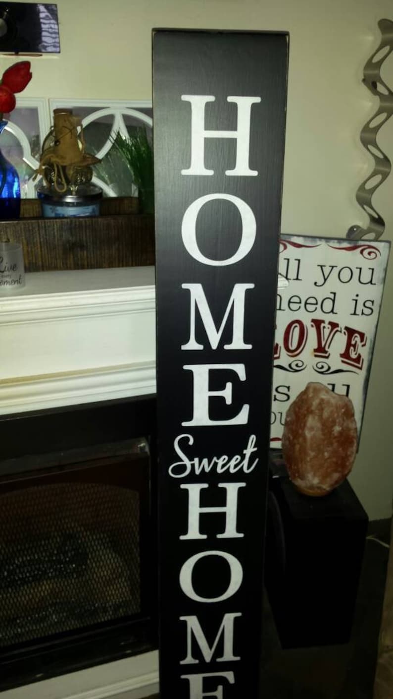 vertical wooden porch signs