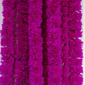 Mexican pink velvet flower garland for Day of the Dead altar made of paper.
