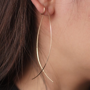 Long wired crossed earrings