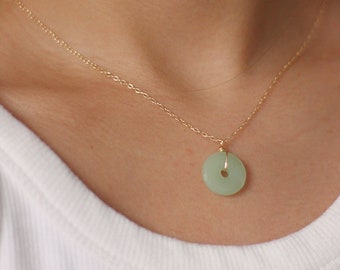 Dainty necklace with green donut pendant