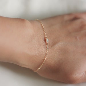 Dainty gold tiny oval pearl bracelet 1 2 3 rice pearls image 2