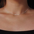Dainty fine baby pearl necklace product logo