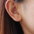 Teeny tiny star earrings / nose studs - dainty stud earring product logo