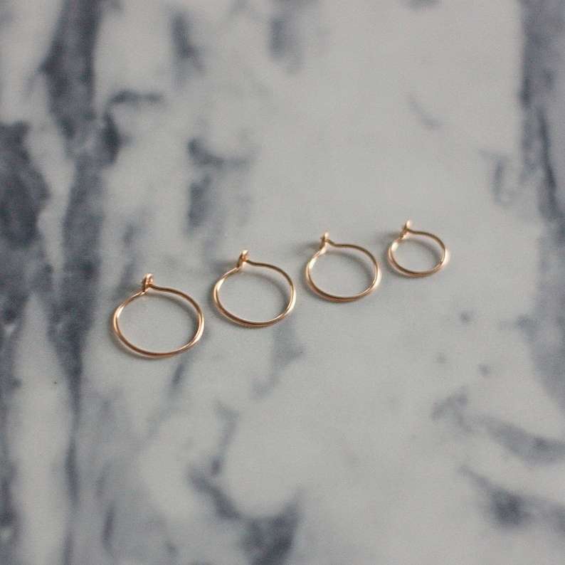 Tiny thin hoop earrings, huggie earrings, gold filled dainty hoops, sleeper earrings zdjęcie 4