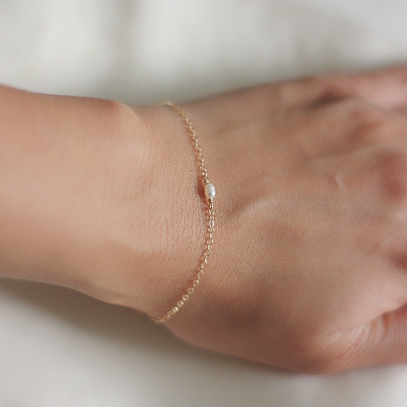 Dainty gold oval pearl bracelet image 2