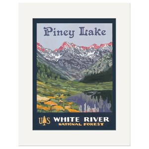 May include: A framed print featuring a vintage travel poster design. The artwork depicts a mountain landscape with a lake, trees, and the text "Piney Lake" and "White River National Forest". The color palette includes blues, greens, and reds.