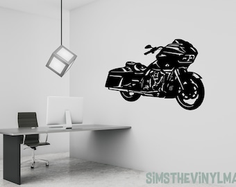 May include: Black and white silhouette of a motorcycle with a large windscreen. The motorcycle is on a white background.