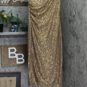 green emerald velvet dress Reagan Fitted Sequin Dress - Gold Metallic Treasure Box Sequin Knit – The  Islands main image 0