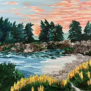May include: A painting of a river scene with a beach in the foreground. The river is blue and green, and the beach is white with gray rocks. There are trees on both sides of the river, and the sky is a soft pink and blue.