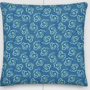 Fluffy Blue Throw Pillows: Pillow with scattered fluffy abstract pattern in blue-greens. Includes pillow insert and case, in 3 sizes