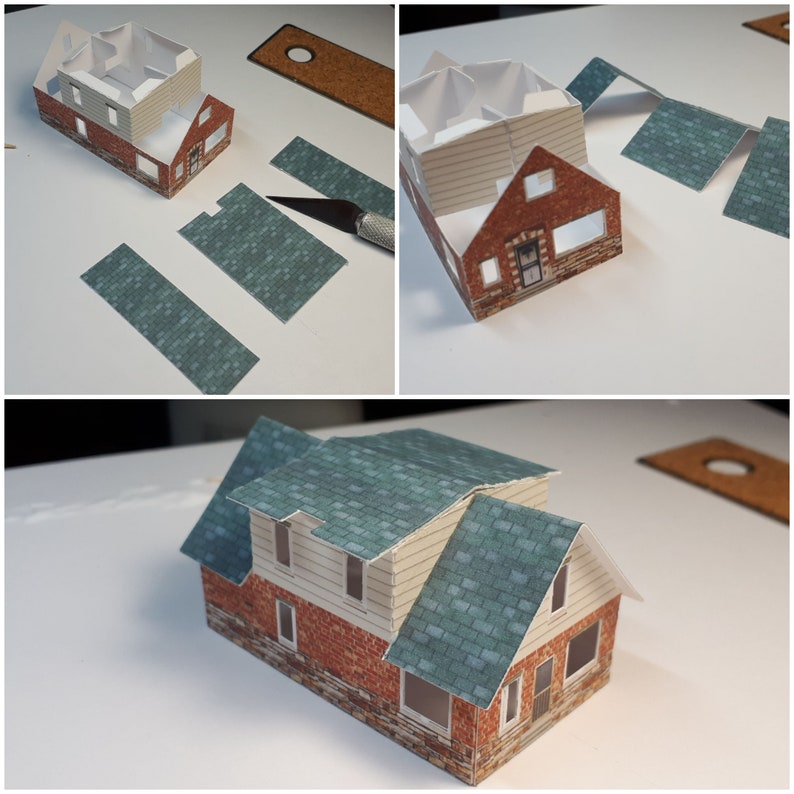 May include: A paper model of a house with a brick exterior and a green roof. The model is assembled and ready to be displayed.