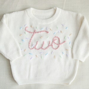 Hand embroidered One Sweater First Birthday Sweater Hand embroidered sweater White Sweater Pink Wording with pastel sprinkles
