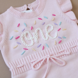 One pink romper first birthday handembroidered romper with confetti sprinkles