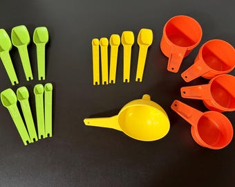 Your choice of Tupperware ® replacement measuring spoons or cups or funnel