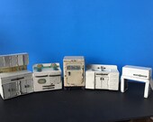 Your choice of one appliance Pretty maid refrigerator Linemar sink stove ironer kitchen cabinet