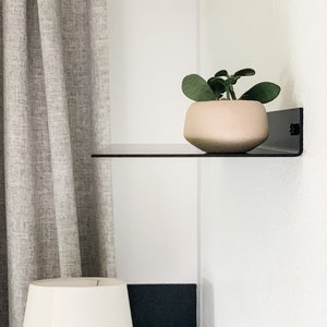 small metal wall shelf