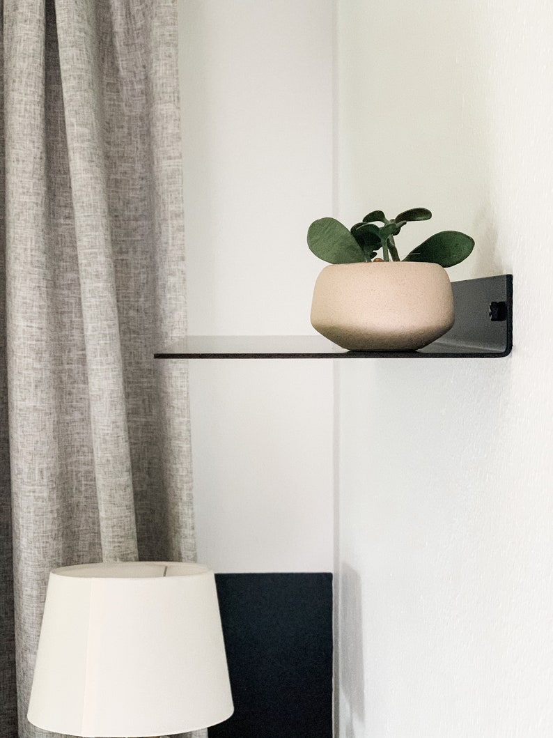 small metal wall shelf