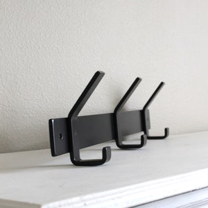 black wall mounted hook rack