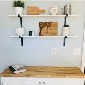 bookshelves with iron brackets