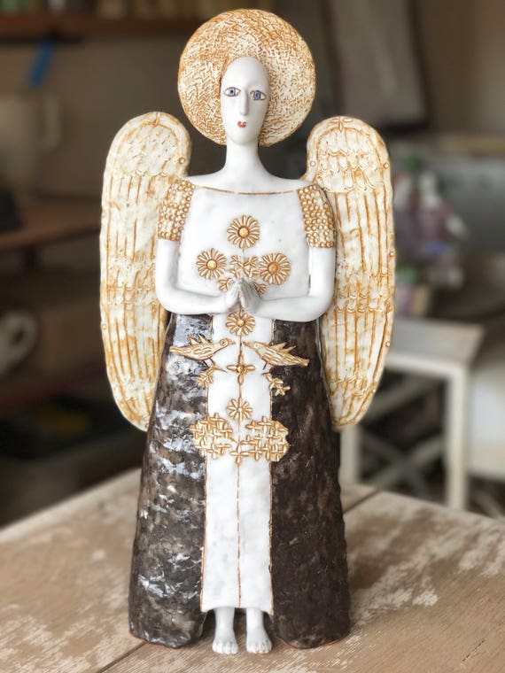 clay angel sculpture