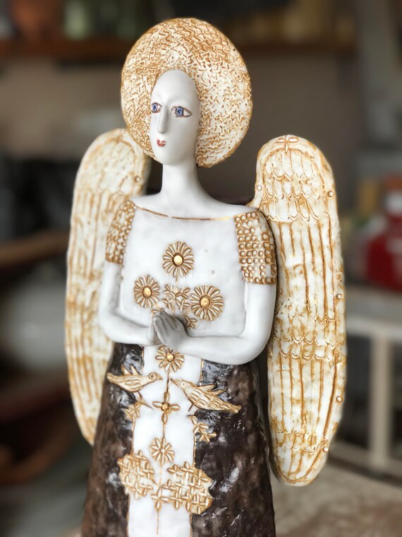 clay angel sculpture