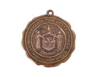 Pendentif médaille de bronze Sceau de NY vintage