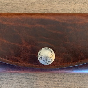 Cartera compacta de cuero para pesca con mosca
