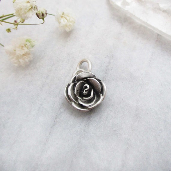 Silver rose best sale charm