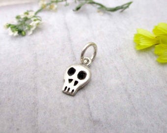 Tiny Skull Charm in Sterling Silver
