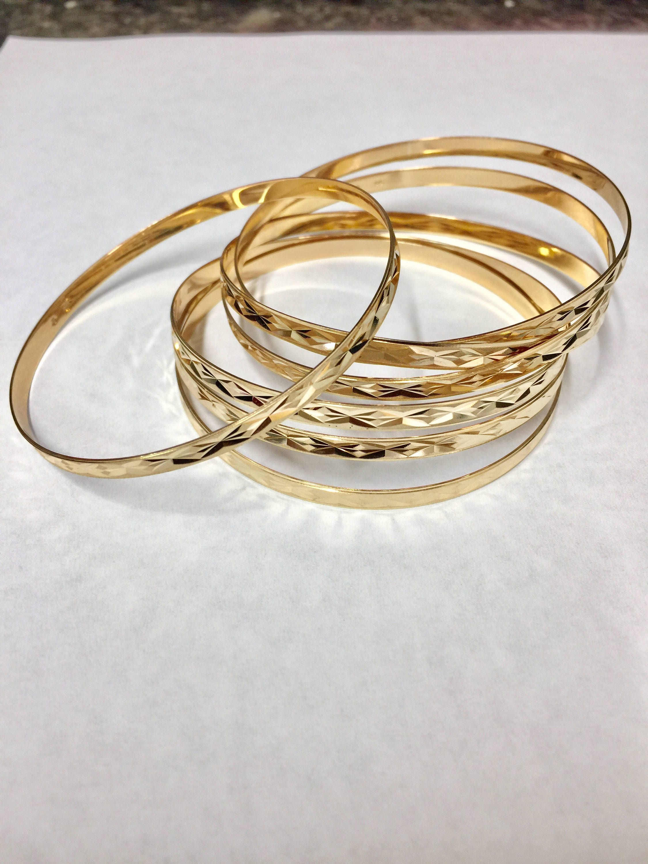 7 pc Set)2 Gold Bangles 2 Gold Bracelets 3 Swarovski Crystal Bracelet –  Vanessa Beaded Jewelry