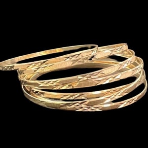 14k Yellow gold seven days design diamond cut bangle bracelet , size 8.5-9