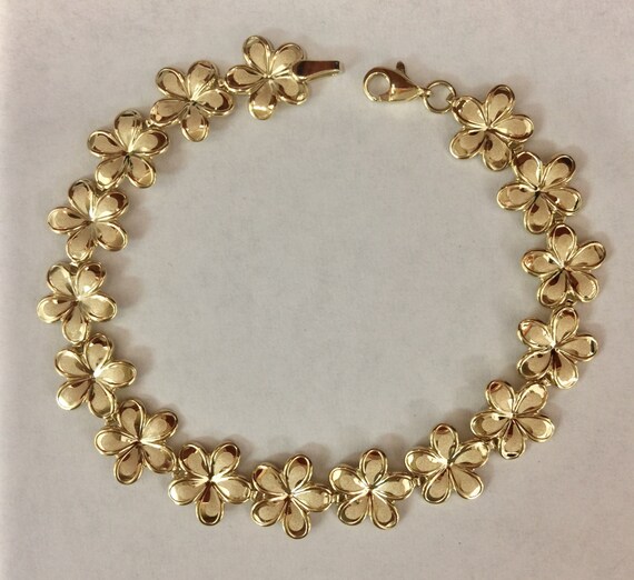 Gold on sale plumeria bracelet